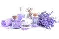 Spa composition with flowers of lavender, cream, salt and bottle of essential oil on a white background Royalty Free Stock Photo