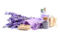 Spa composition with flowers of lavender, salt and bottle of essential oil on white background Royalty Free Stock Photo