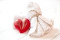 Spa composition with heart shaped soap towel close up. Royalty Free Stock Photo