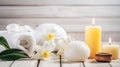 Spa composition massage herbal ball, plumeria flower in vase,coconut coffee soap,white towels and candle. AI Generative Royalty Free Stock Photo