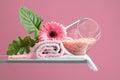 Spa composition with pink salt, Gerber, and towels Royalty Free Stock Photo