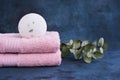 SPA concept. Bath bombs and two pink towels on light background. Copy space for text Royalty Free Stock Photo