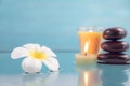 Spa concept with candle, stone, flower and bamboo