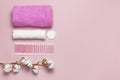 Spa concept. Flat lay background with cotton branch, cotton pads, eared sticks, pink towel. Cotton Cosmetic Makeup Removers Royalty Free Stock Photo