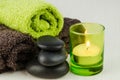 Spa concept with lava stones and candle Royalty Free Stock Photo