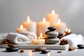 Spa concept, massage stones with towels and candles. Royalty Free Stock Photo