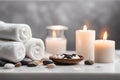 Spa concept, massage stones with towels and candles. Royalty Free Stock Photo