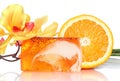 Spa concept, peach soap, flower and fresh orange