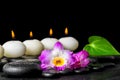 Spa concept of row white candles, orchid flower dendrobium and g Royalty Free Stock Photo