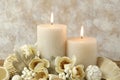 Spa setting with white burning candles and potpourri. Spa still life Royalty Free Stock Photo