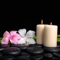 Spa concept of white, pink hibiscus flowers, candles and natural Royalty Free Stock Photo