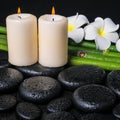 Spa concept of zen basalt stones, two white flower frangipani Royalty Free Stock Photo