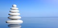 Zen stones stack on water, blue sky background. 3d illustration Royalty Free Stock Photo