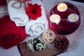 SPA consist from towels, candles, flowers, and aromatherapy water Royalty Free Stock Photo