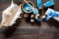 Spa cosmetic set with sea salt for bath and shell on wooden background top view mockup Royalty Free Stock Photo