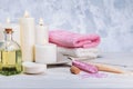 Spa cosmetics products, bath salt, essential oil, soap, towel and aroma candles Royalty Free Stock Photo
