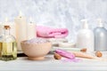 Spa cosmetics products, lotion, cream, bath salt, essential oil, soap, towels Royalty Free Stock Photo