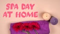 Spa Day At Home. Candles, towel and flowers on a light background Royalty Free Stock Photo