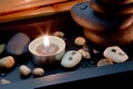 Spa decoration in asian style with stones and candle Royalty Free Stock Photo