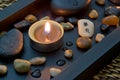 Spa decoration in asian style with stones and candle Royalty Free Stock Photo