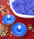 Spa essentials (blue salt, candle and flower) Royalty Free Stock Photo