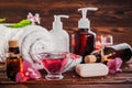 Spa essentials including natural oils, salt, soap and candle. Organic cosmetics concept Royalty Free Stock Photo