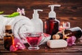 Spa essentials including natural oils, salt, soap and candle. Organic cosmetics concept