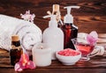 Spa essentials including natural oils, salt, soap and candle. Organic cosmetics concept Royalty Free Stock Photo