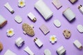 Spa essentials on violet background, flat lay Royalty Free Stock Photo