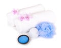 White towels, salt, bath sponge and aromatic flowers