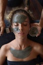 Spa Face Mask. Beauty Treatment For Skin Care. Beautician Applying Mud On Female Face. Relaxed Model On Cosmetic Procedure. Royalty Free Stock Photo