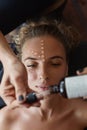 Spa Face Mask. Skin Care Beauty Treatment For Female. Beautician Applying Facial Oil Drops. Relaxed Woman On Procedure. Royalty Free Stock Photo