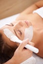 Spa, face mask and woman with cream, dermatology and grooming with skincare, cleanse and detox. Female person, model and