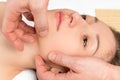 Spa facial massage hands cosmetologist man