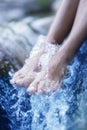 Spa - Female leg massage with aerated blue water