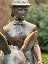 Spa guest lady with donkey, bronze statue in Bad Harzburg, health resort in the Harz mountains, Germany.