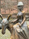 Spa guest lady with donkey, bronze statue in Bad Harzburg, health resort in the Harz mountains, Germany.