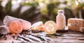 Spa handmade soap with white towels and sea salt, the composition of the tropical leaves with a candle Royalty Free Stock Photo