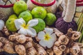 Spa, heath care set of essential oils, soap, ginger, turmeric roots and spices on a wooden tray Royalty Free Stock Photo