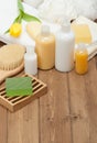 Spa Kit. Shampoo, Soap Bar And Liquid. Shower Gel. Towels. Woode Royalty Free Stock Photo
