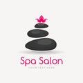 Spa logo template with dark spa stones and lotus flower on the light background. Royalty Free Stock Photo