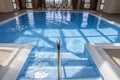 Spa luxury swimming pool with wooden structure skylight Royalty Free Stock Photo