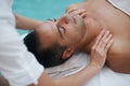 Spa, man and hands with massage for skincare at resort, luxury hotel and vacation for relax and therapeutic pamper Royalty Free Stock Photo