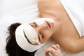 Spa Mask. Woman in Spa Salon. Face Mask. Facial Clay Mask. Royalty Free Stock Photo