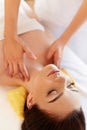 Spa Massage. Beautiful Woman Gets Spa Treatment in Salon.