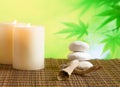 Spa massage border background with candles near stone and wood Royalty Free Stock Photo