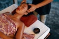 Spa Massage. Hands Massaging Woman Head At Thai Beauty Salon