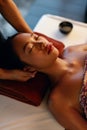 Spa Massage. Hands Massaging Woman Head At Thai Beauty Salon