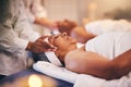 Spa, massage and head of senior woman while on table to relax for calm, peace and zen time with a therapist for health Royalty Free Stock Photo