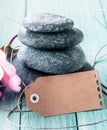 Spa massage stones with a blank label Royalty Free Stock Photo